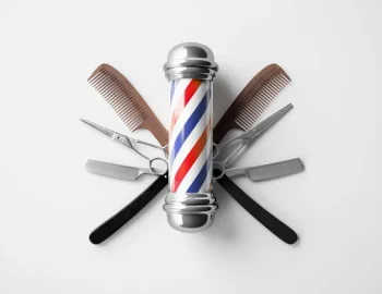 depositphotos_219568142-stock-photo-barbers-pole-tools-white-background